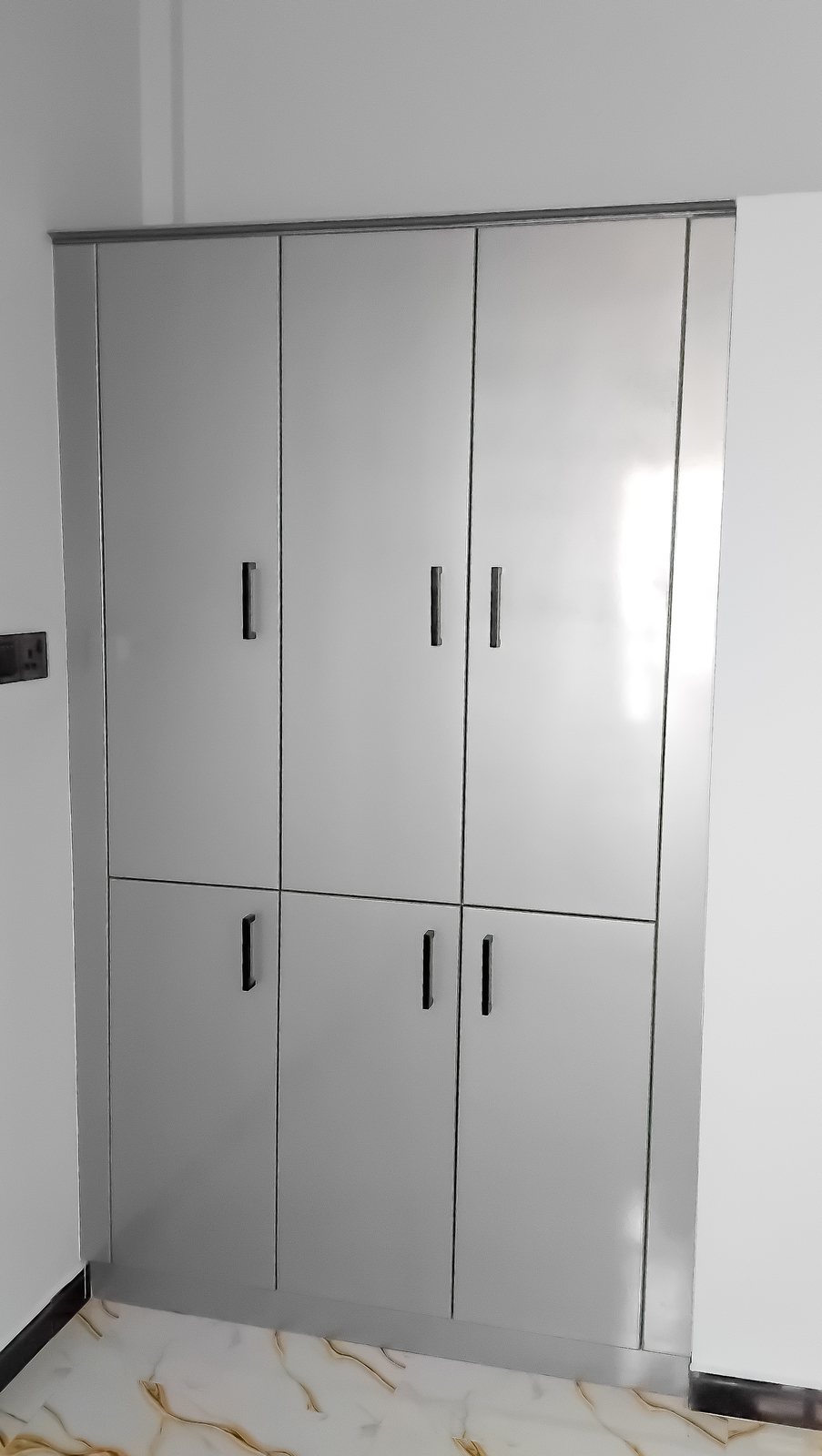 Interior shelving and drawer layout of fitted bedroom wardrobe